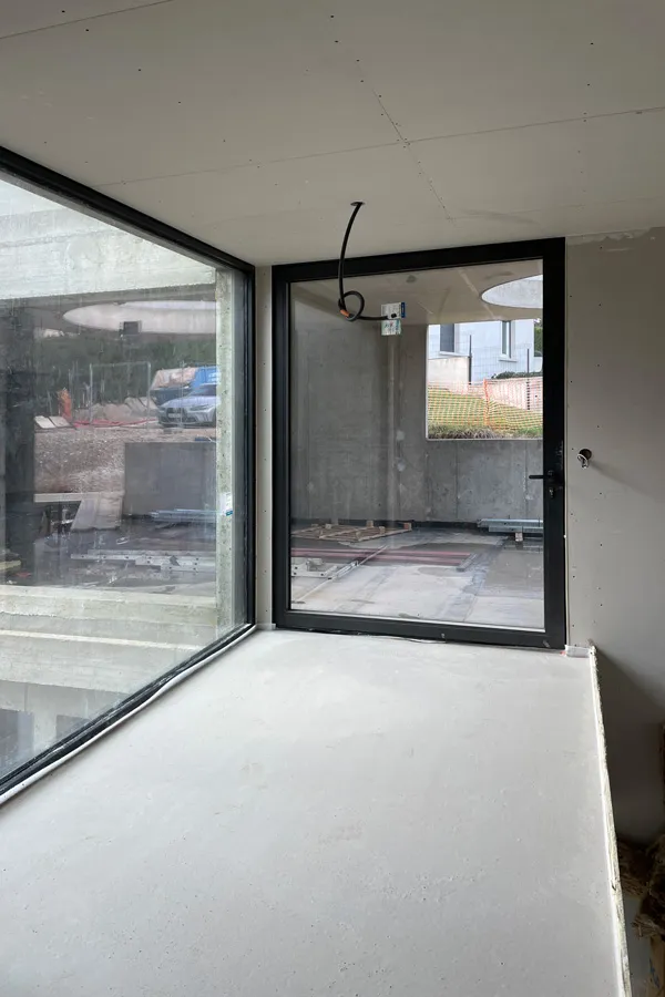 Maitrise d'œuvre dans une maison en béton, à Lyon